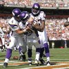 CLEVELAND - SEPTEMBER 13:  Percy Harvin #12 of the Minnesota Vikings celebrates with Brett Farve #4 and Bernard Berrian #87 after scoring a touchdown against the Cleveland Browns at Cleveland Browns Stadium on September 13, 2009 in Cleveland, Ohio.  (Phot