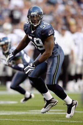 SEATTLE - SEPTEMBER 03:  Arron Curry #59 of the Seattle Seahawks moves on the field during the game against the Oakland Raiders on September 3, 2009 at Qwest Field in Seattle, Washington. (Photo by Otto Greule Jr/Getty Images)  