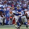EAST RUTHERFORD, NJ - SEPTEMBER 13:  Eli Manning #10 of the New York Giants throws a pass against the Washington Redskins on September 13, 2009 at Giants Stadium in East Rutherford, New Jersey.  (Photo by Jim McIsaac/Getty Images)