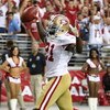 GLENDALE, AZ - SEPTEMBER 13:  Runningback Frank Gore #21 of the San Francisco 49ers scores a 3 yard touchdown reception against the Arizona Cardinals during the NFL game at the Universtity of Phoenix Stadium on September 13, 2009 in Glendale, Arizona. The