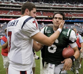 HOUSTON - SEPTEMBER 13:  Houston Texans backup quarterback Dan Orlovsky #7 congratulates quarterback Mark Sanchez #6 of the New York Jets after the Jets defeated Houston 24-7 at Reliant Stadium on September 13, 2009 in Houston, Texas.  (Photo by Bob Levey