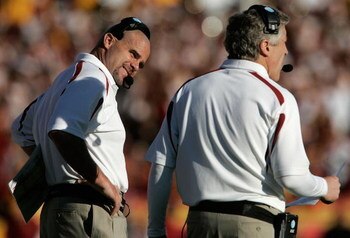 LOS ANGELES, CA - DECEMBER 01:  Nick Holt talks with head coach Pete Carroll of the USC Trojans during the college football game against the UCLA Bruins at the Los Angeles Memorial Coliseum on December 1, 2007 in Los Angeles, California.  (Photo by Jeff G