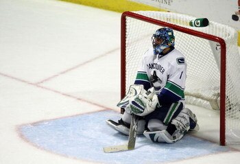 CHICAGO - MAY 11:  Goalie Roberto Luongo #1 of the Vancouver Canucks sits on the ice after he gave up a hat trick goal to Patrick Kane #88 of the Chicago Blackhawks in the third period during Game Six of the Western Conference Semifinal Round of the 2009 