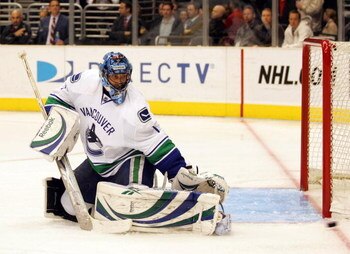 LOS ANGELES, CA - MARCH 09:  Goaltender Roberto Luongo #1 of the Vancouver Canucks makes a leg pad save in the second period during the NHL game against the Los Angeles Kings at Staples Center on March 9, 2009 in Los Angeles, California. The Kings defeate