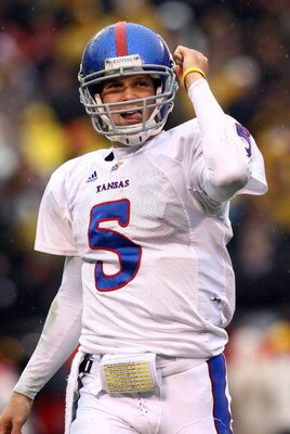 KANSAS CITY, MO - NOVEMBER 29:  Quarterback Todd Reesing #5 of the Kansas Jayhawks celebrates after  a touchdown during the first half of the game against the Missouri Tigers on November 29, 2008 at Arrowhead Stadium in Kansas City, Missouri.  (Photo by J
