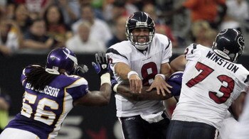 HOUSTON - AUGUST 31:  Quarterback Matt Schaub #8 of the Houston Texans is hit by linebacker E.J. Henderson #56 as he releases the ball during their game at Reliant Stadium on August 31, 2009 in Houston, Texas.  (Photo by Bob Levey/Getty Images)