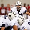 ARLINGTON, TX - SEPTEMBER 05:  Quarterback Max Hall #15 of the Brigham Young Cougars drops back to pass against the Oklahoma Sooners at Cowboys Stadium on September 5, 2009 in Arlington, Texas.  (Photo by Ronald Martinez/Getty Images)