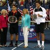 NEW YORK - SEPTEMBER 14:  (L-R) USTA president Lucy S. Garvin, Roger Federer of Switzerland and Juan Martin Del Potro of Argentina pose with the trophies after the Men's Singles final on day fifteen of the 2009 U.S. Open at the USTA Billie Jean King Natio
