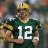 GREEN BAY, WI - SEPTEMBER 13: Aaron Rodgers #12 of the Green Bay Packers participates in warm-ups before a game against the Chicago Bears on September 13, 2009 at Lambeau Field in Green Bay, Wisconsin. The Packers defeated the Bears 21-15.  (Photo by Jona