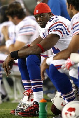 FOXBORO, MA - SEPTEMBER 14:  Terrell Owens #81 of the Buffalo Bills stis on the bench in the second half against the New England Patriots on September 14, 2009 at Gillette Stadium in Foxboro, Massachusetts. (Photo by Elsa/Getty Images)