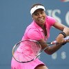 NEW YORK - SEPTEMBER 06:  Venus Williams of the United States returns a shot against Kim Clijsters of Belgium during day seven of the 2009 U.S. Open at the USTA Billie Jean King National Tennis Center on September 6, 2009 in the Flushing neighborhood of t