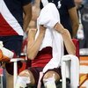 NEW YORK - SEPTEMBER 06:  Vera Zvonareva of Russia sits on her bench with a towel on her head during a break in play against Flavia Pennetta of Italy during day seven of the 2009 U.S. Open at the USTA Billie Jean King National Tennis Center on September 6
