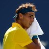 NEW YORK - SEPTEMBER 13:  Rafael Nadal of Spain wipes his brow during the Men�s Singles Semifinal match against Juan Martin Del Potro of Argentina on day fourteen of the 2009 U.S. Open at the USTA Billie Jean King National Tennis Center on September 13, 2