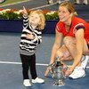 NEW YORK - SEPTEMBER 13:  Kim Clijsters of Belgium and daughter Jada pose with the championship trophy after Clijsters defeated Caroline Wozniacki of Denmark in the Women�s Singles final on day fourteen of the 2009 U.S. Open at the USTA Billie Jean King N