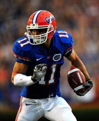 GAINESVILLE, FL - SEPTEMBER 5:  Riley Cooper #11 of the Florida Gators runs for a touchdown during the game against the Charleston Southern Buccaneers at Ben Hill Griffin Stadium on September 5, 2009 in Gainesville, Florida.  (Photo by Sam Greenwood/Getty