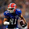GAINESVILLE, FL - SEPTEMBER 5:  Riley Cooper #11 of the Florida Gators runs for a touchdown during the game against the Charleston Southern Buccaneers at Ben Hill Griffin Stadium on September 5, 2009 in Gainesville, Florida.  (Photo by Sam Greenwood/Getty