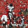 PISCATAWAY, NJ - SEPTEMBER 07:  Mardy Gilyard #1 of the Cincinnati Bearcats makes a catch for a touchdown against Brandon Bing #23 of the Rutgers Scarlet Knights at Rutgers Stadium on September 7, 2009 in Piscataway, New Jersey.   (Photo by Jim McIsaac/Ge