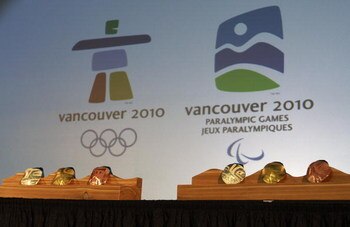 VANCOUVER, BRITISH COLUMBIA - OCTOBER 15:  The medals for the 2010 Olympic (R) and Paralympic Winter Games are displayed following their unveiling October 15, 2009 in Vancouver, British Columbia, Canada.  (Photo by Jeff Vinnick/Getty Images)