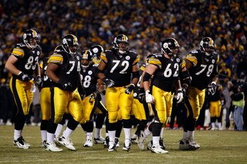 PITTSBURGH - JANUARY 11:  (L-R) Heath Miller #83, Willie Colon #74, Carey Davis, #38, Darnell Stapleton #72, Justin Hartwig #62 and Max Starks #78 of the Pittsburgh Steelers break the offensive huddle against the San Diego Chargers during their AFC Divisi