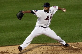 NEW YORK - AUGUST 20:  Johan Santana #57 of the New York Mets delivers a pitch against the Atlanta Braves on August 20, 2009 at Citi Field in the Flushing neighborhood of the Queens borough of New York City.  (Photo by Jim McIsaac/Getty Images)