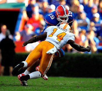 GAINESVILLE, FL - SEPTEMBER 19:  Tim Tebow #15 of the Florida Gators is tackled by Eric Berry #14 of the Tennessee Volunteers during the game at Ben Hill Griffin Stadium on September 19, 2009 in Gainesville, Florida.  (Photo by Sam Greenwood/Getty Images)
