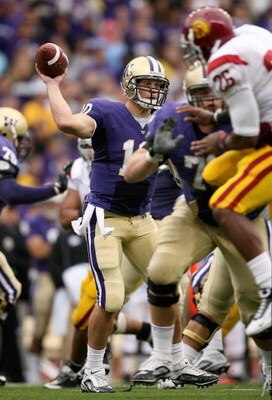 SEATTLE - SEPTEMBER 19:  Quarterback Jake Locker #10 of the Washington Huskies passes against the USC Trojans on September 19, 2009 at Husky Stadium in Seattle, Washington. The Huskies defeated the Trojans 16-13. (Photo by Otto Greule Jr/Getty Images)
