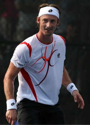 WASHINGTON - AUGUST 5:  Juan Carlos Ferrero of Spain looks on against Tommy Robredo of Spain during Day 3 of the Legg Mason Tennis Classic at the William H.G. FitzGerald Tennis Center August 5, 2009 in Washington, DC.  (Photo by Jim McIsaac/Getty Images)