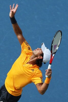 NEW YORK - SEPTEMBER 09:  Fernando Verdasco of Spain serves to Novak Djokovic of Serbia during day ten of the 2009 U.S. Open at the USTA Billie Jean King National Tennis Center on September 9, 2009 in the Flushing neighborhood of the Queens borough of New