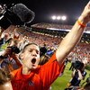 AUBURN, AL - SEPTEMBER 19:  Head coach Gene Chizik of the Auburn Tigers celebrates their 41-30 win over the West Virginia Mountaineers at Jordan-Hare Stadium on September 19, 2009 in Auburn, Alabama.  (Photo by Kevin C. Cox/Getty Images)