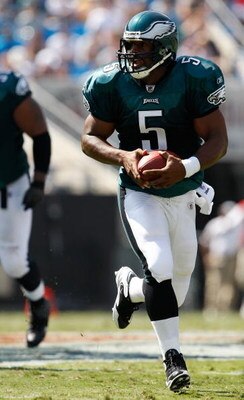 CHARLOTTE, NC - SEPTEMBER 13:  Quarterback Donovan McNabb #5 of the Philadelphia Eagles runs with the ball in the second half of their NFL season opener against the Carolina Panthers at Bank of America Stadium on September 13, 2009 in Charlotte, North Car
