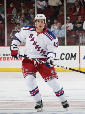 NEWARK, NJ - SEPTEMBER 16: Michael Del Zotto #43 of the New York Rangers skates against the New Jersey Devils at the Prudential Center on September 16, 2009 in Newark, New Jersey. The Devils defeated the Rangers 3-2 in the shoot out. (Photo by Bruce Benne